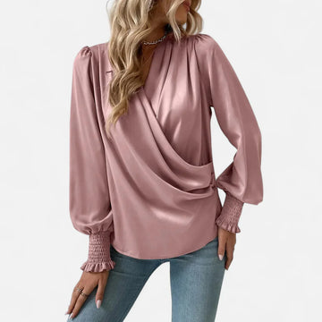 Elegant feminine blouse with V-neck and lantern sleeves